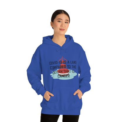 Covid-19 Is A Lake Compared To The Ocean That Is Cancer - Unisex Heavy Blend™ Hooded Sweatshirt