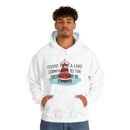 Covid-19 Is A Lake Compared To The Ocean That Is Cancer - Unisex Heavy Blend™ Hooded Sweatshirt