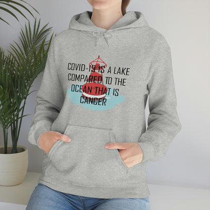 Covid-19 Is A Lake Compared To The Ocean That Is Cancer - Unisex Heavy Blend™ Hooded Sweatshirt