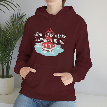 Covid-19 Is A Lake Compared To The Ocean That Is Cancer - Unisex Heavy Blend™ Hooded Sweatshirt