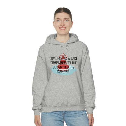 Covid-19 Is A Lake Compared To The Ocean That Is Cancer - Unisex Heavy Blend™ Hooded Sweatshirt